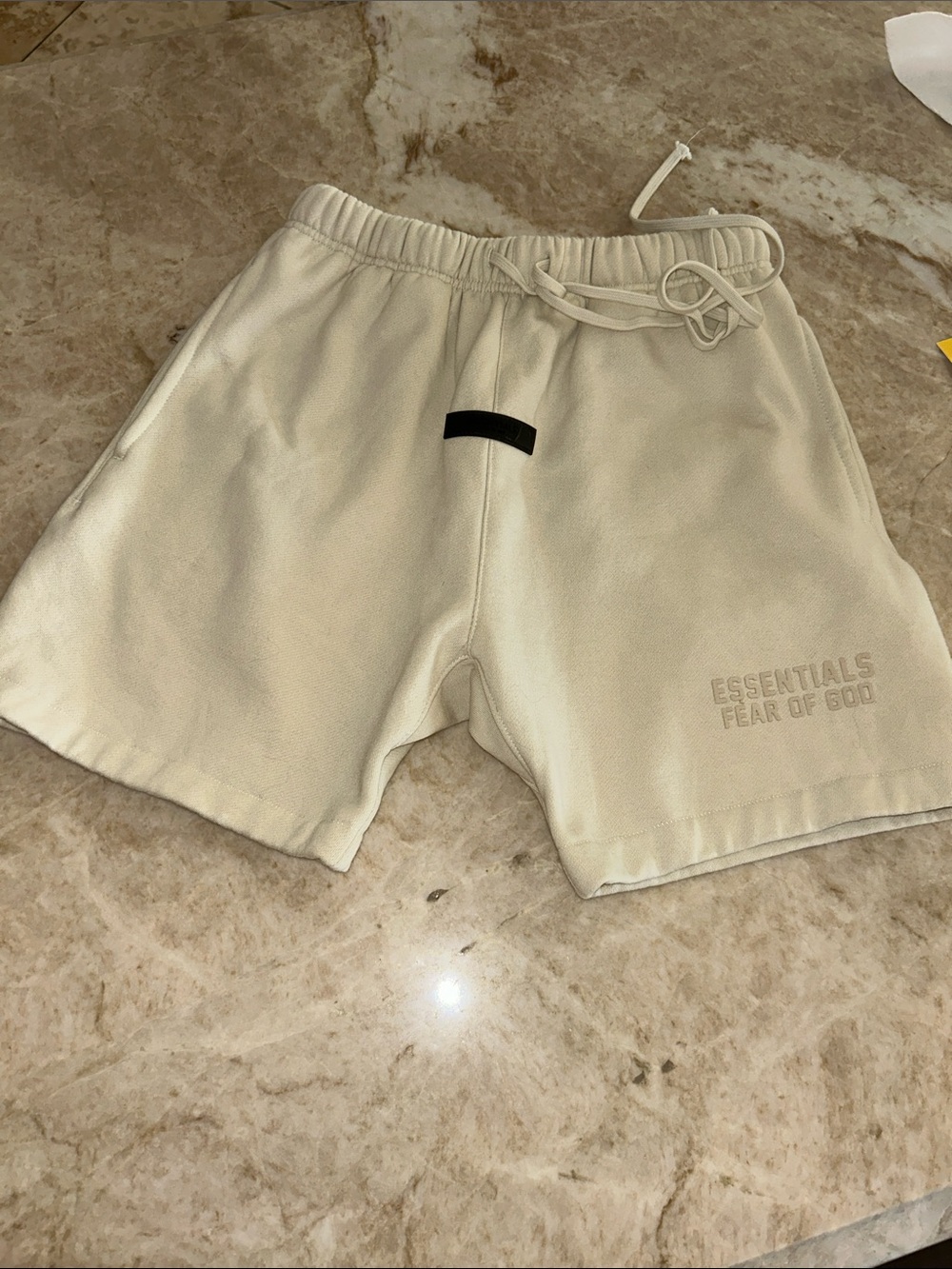 Fear of God ESSENTIALS Cream Logo Fleece Athletic Shorts
